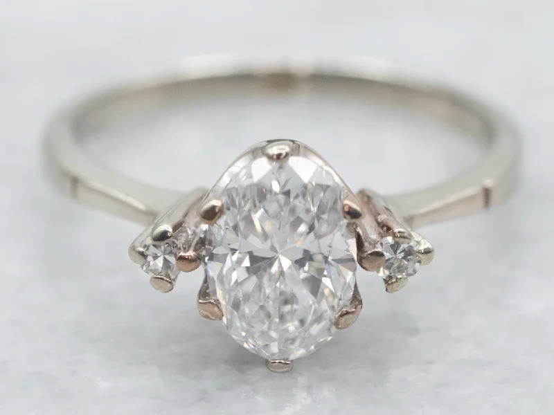 vintage style engagement rings -Simple Oval-Cut Diamond Engagement Ring